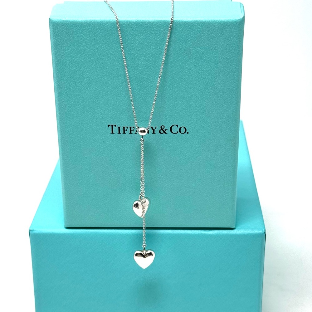 Authentic Tiffany & Co. Double Solid Heart  Dangle Pendant Necklace.